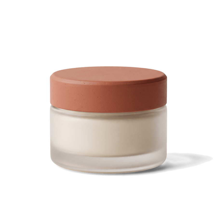 A frosted balm jar with a terracotta lid